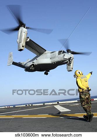 An MV-22 Osprey launches from the USS Nassau. View Large Photo Image Picture - An MV-22 Osprey launches from the USS Nassau.. Fotosearch