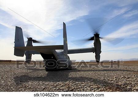 An MV-22 Osprey sits outside a forward operating base in Afghanistan. View Large Photo Image Picture - An MV-22 Osprey sits outside a forward operating base in Afghanistan.. Fotosearch