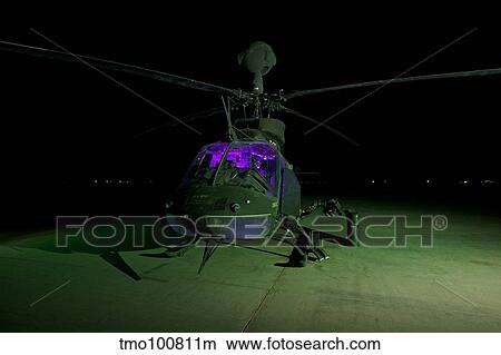 An OH-58D Kiowa helicopter at COB Speicher, Tikrit, Iraq. View Large Photo Image Picture - An OH-58D Kiowa helicopter at COB Speicher, Tikrit, Iraq.. Fotosearch