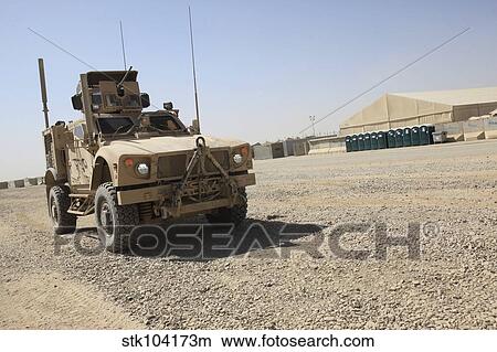 Picture - An Oshkosh M-ATV sits parked at Camp Leatherneck, Afghanistan.. Fotosearch