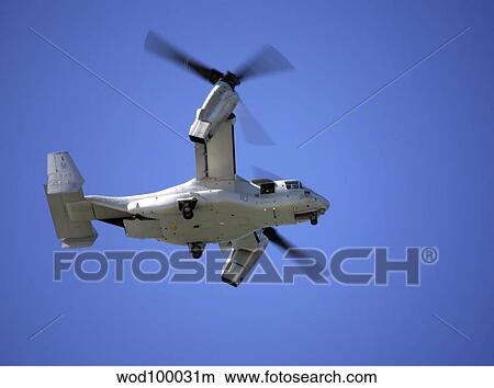 An Osprey tiltrotor aircraft in flight. View Large Photo Image Picture - An Osprey tiltrotor aircraft in flight.. Fotosearch