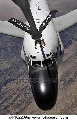 An RC-135 Rivet Joint Reconnaissance aircraft receives fuel from a KC-135 Stratotanker. View Large Photo Image Picture - An RC-135 Rivet Joint Reconnaissance aircraft receives fuel from a KC-135 Stratotanker.. Fotosearch