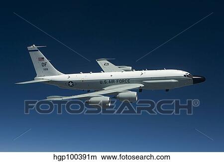 An RC-135W Rivet Joint aircraft flies over the Midwest. View Large Photo Image Picture - An RC-135W Rivet Joint aircraft flies over the Midwest.. Fotosearch