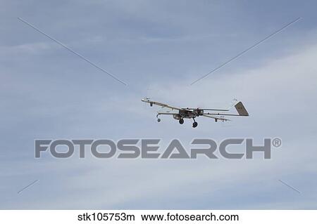 An RQ-7 Shadow unmanned aerial vehicle in flight. View Large Photo Image Picture - An RQ-7 Shadow unmanned aerial vehicle in flight.. Fotosearch
