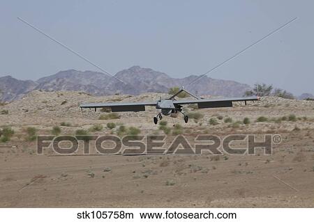 An RQ-7B Shadow unmanned aerial vehicle prepares to land. View Large Photo Image Picture - An RQ-7B Shadow unmanned aerial vehicle prepares to land.. Fotosearch