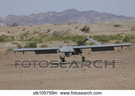 An RQ-7B Shadow unmanned aerial vehicle prepares to land. View Large Photo Image Picture - An RQ-7B Shadow unmanned aerial vehicle prepares to land.. Fotosearch