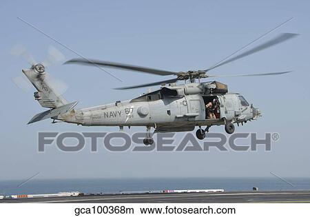 An SH-60F Seahawk embarked aboard USS Theodore Roosevelt. View Large Photo Image Picture - An SH-60F Seahawk embarked aboard USS Theodore Roosevelt.. Fotosearch