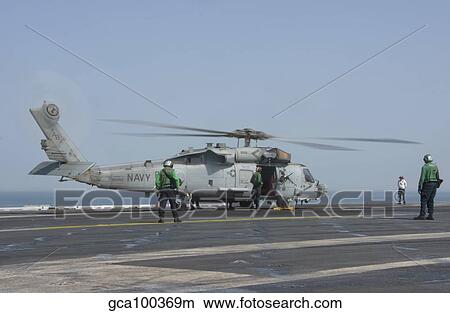 An SH-60F Seahawk embarked aboard USS Theodore Roosevelt. View Large Photo Image Picture - An SH-60F Seahawk embarked aboard USS Theodore Roosevelt.. Fotosearch