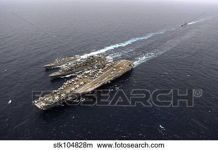 An underway replenishment with ships of the John C. Stennis Carrier Strike Group. View Large Photo Image Picture - An underway replenishment with ships of the John C. Stennis Carrier Strike Group.. Fotosearch