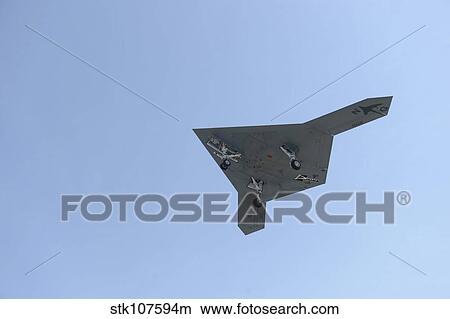 An X-47B unmanned combat air system in flight. View Large Photo Image Picture - An X-47B unmanned combat air system in flight.. Fotosearch