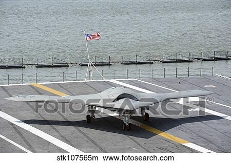 An X-47B Unmanned Combat Air System. View Large Photo Image Picture - An X-47B Unmanned Combat Air System.. Fotosearch