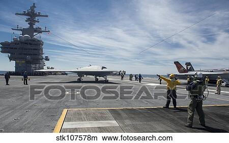 An X-47B Unmanned Combat Air System aboard USS George H. W. Bush. View Large Photo Image Picture - An X-47B Unmanned Combat Air System aboard USS George H. W. Bush.. Fotosearch