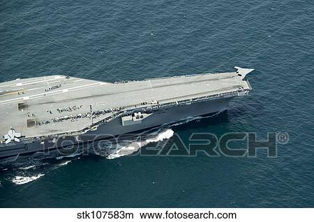 An X-47B Unmanned Combat Air System launches from USS George H. W. Bush. View Large Photo Image Picture - An X-47B Unmanned Combat Air System launches from USS George H. W. Bush.. Fotosearch