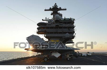 An X-47B Unmanned Combat Air System aboard USS George H. W. Bush. View Large Photo Image Picture - An X-47B Unmanned Combat Air System aboard USS George H. W. Bush.. Fotosearch