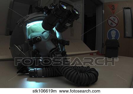 AN/AVS-9 Night Vision Goggles sit atop a fighter pilot's helmet. View Large Photo Image Picture - AN/AVS-9 Night Vision Goggles sit atop a fighter pilot's helmet.. Fotosearch