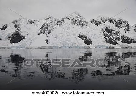 Antarctic mountains reflected in the sea, Antarctica. View Large Photo Image Stock Photograph - Antarctic mountains reflected in the sea, Antarctica.. Fotosearch