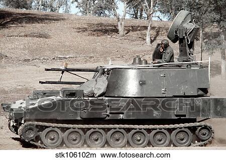 Anti-aircraft guns mounted on an M109 chassis to simulate a Soviet ZSU-23-4. View Large Photo Image Picture - Anti-aircraft guns mounted on an M109 chassis to simulate a Soviet ZSU-23-4.. Fotosearch