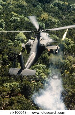 Apache Helicopter Firing View Large Photo Image Picture - Apache Helicopter Firing. Fotosearch