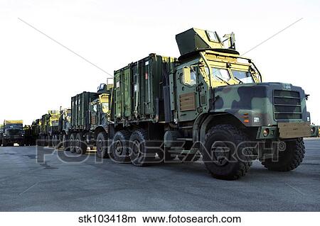 Armored trucks sit on the pier at Morehead City, North Carolina, awaiting deployment. View Large Photo Image Picture - Armored trucks sit on the pier at Morehead City, North Carolina, awaiting deployment.. Fotosearch