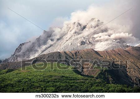 Ash and gas rising from lava dome of Soufriere Hills volcano, Montserrat, Caribbean. View Large Photo Image Stock Photograph - Ash and gas rising from lava dome of Soufriere Hills volcano, Montserrat, Caribbean.. Fotosearch