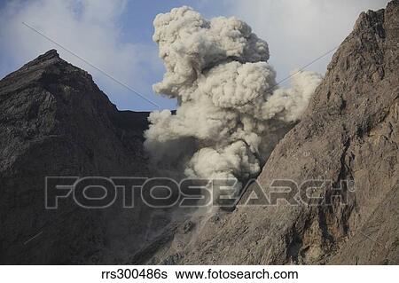 Ash cloud rises from crater of Batu Tara volcano, Indonesia. View Large Photo Image Stock Photograph - Ash cloud rises from crater of Batu Tara volcano, Indonesia.. Fotosearch