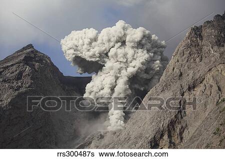 Ash cloud rises from crater of Batu Tara volcano, Indonesia. View Large Photo Image Stock Photograph - Ash cloud rises from crater of Batu Tara volcano, Indonesia.. Fotosearch