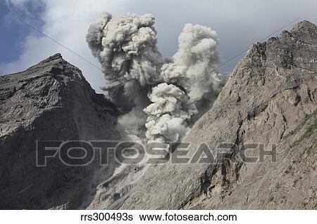 Ash cloud rises from crater of Batu Tara volcano, Indonesia. View Large Photo Image Stock Photograph - Ash cloud rises from crater of Batu Tara volcano, Indonesia.. Fotosearch