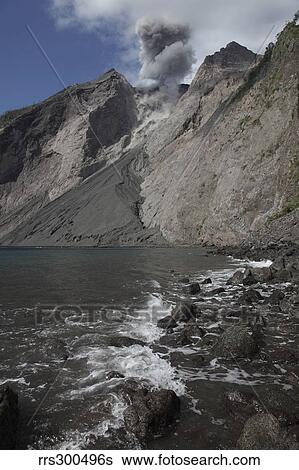 Ash cloud rises from crater of Batu Tara volcano, Indonesia. View Large Photo Image Stock Photograph - Ash cloud rises from crater of Batu Tara volcano, Indonesia.. Fotosearch