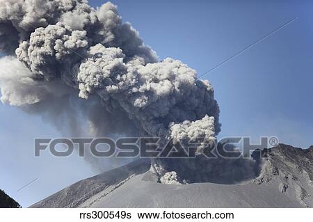 Stock Photograph - Ash cloud rising from Sakurajima volcano, Japan.. Fotosearch