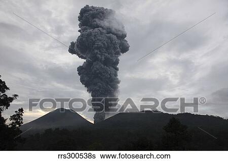 Stock Photograph - Ash cloud rising from Tompaluan crater at Lokon-Empung volcano, Indonesia.. Fotosearch