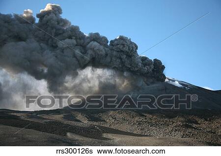 Ash clouds erupting from crater during eruption of Mount Etna volcano, Sicily, Italy. View Large Photo Image Stock Photograph - Ash clouds erupting from crater during eruption of Mount Etna volcano, Sicily, Italy.. Fotosearch