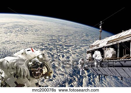 Astronauts performing work on a space station while orbiting Earth. View Large Photo Image Stock Photograph - Astronauts performing work on a space station while orbiting Earth.. Fotosearch