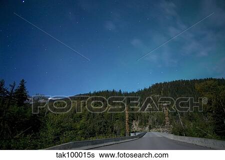 Aurora above totem poles. View Large Photo Image Stock Photograph - Aurora above totem poles.. Fotosearch