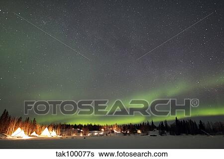 Stock Photograph - Aurora and Milky Way, Aurora Village, Yellowknife, Northwest Territories, Canada.. Fotosearch