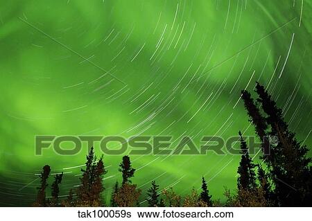 Aurora and star trails. View Large Photo Image Stock Photograph - Aurora and star trails.. Fotosearch