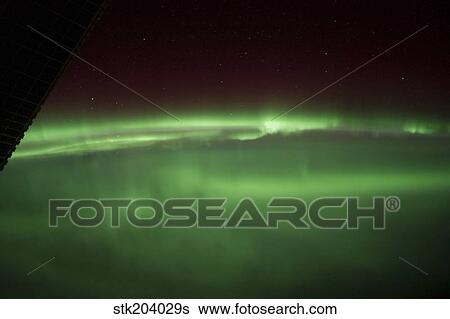 Aurora Borealis as viewed onboard the International Space Station. View Large Photo Image Stock Photograph - Aurora Borealis as viewed onboard the International Space Station.. Fotosearch