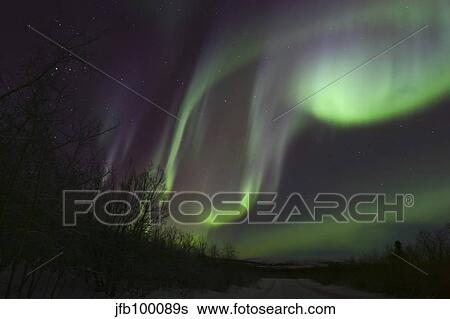 Aurora borealis by Fish lake, Whitehorse, Yukon, Canada. View Large Photo Image Stock Photograph - Aurora borealis by Fish lake, Whitehorse, Yukon, Canada.. Fotosearch