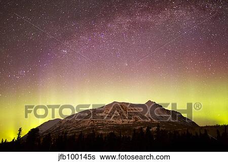 Aurora borealis, Comet Panstarrs and Milky Way over Yukon, Canada. View Large Photo Image Stock Photograph - Aurora borealis, Comet Panstarrs and Milky Way over Yukon, Canada.. Fotosearch