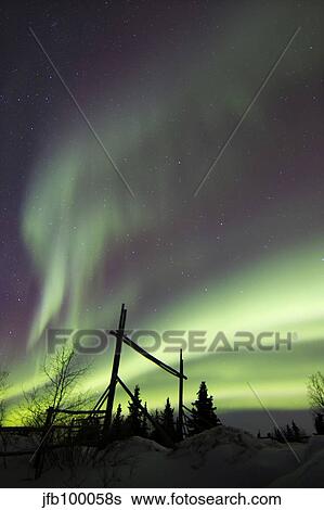 Aurora borealis over a ranch, Whitehorse, Yukon, Canada. View Large Photo Image Stock Photograph - Aurora borealis over a ranch, Whitehorse, Yukon, Canada.. Fotosearch