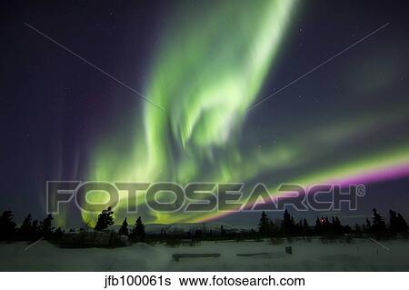 Aurora borealis over a ranch, Whitehorse, Yukon, Canada. View Large Photo Image Stock Photograph - Aurora borealis over a ranch, Whitehorse, Yukon, Canada.. Fotosearch