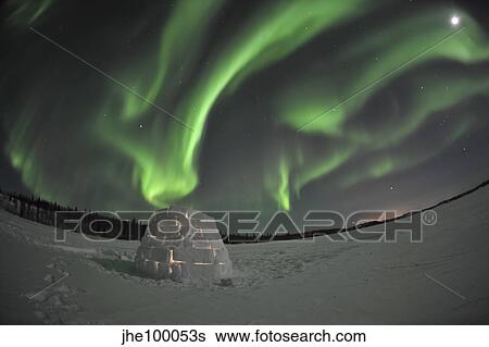 Aurora borealis over an igloo on Walsh Lake, Canada. View Large Photo Image Stock Photograph - Aurora borealis over an igloo on Walsh Lake, Canada.. Fotosearch