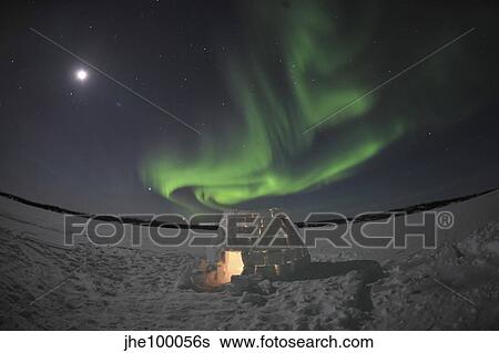 Aurora borealis over an igloo on Walsh Lake, Canada. View Large Photo Image Stock Photograph - Aurora borealis over an igloo on Walsh Lake, Canada.. Fotosearch