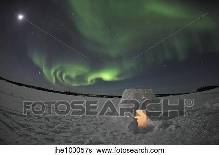 Aurora borealis over an igloo on Walsh Lake, Canada. View Large Photo Image Stock Photograph - Aurora borealis over an igloo on Walsh Lake, Canada.. Fotosearch