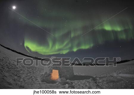 Aurora borealis over an igloo on Walsh Lake, Canada. View Large Photo Image Stock Photograph - Aurora borealis over an igloo on Walsh Lake, Canada.. Fotosearch