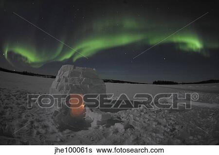 Aurora borealis over an igloo on Walsh Lake, Canada. View Large Photo Image Stock Photograph - Aurora borealis over an igloo on Walsh Lake, Canada.. Fotosearch