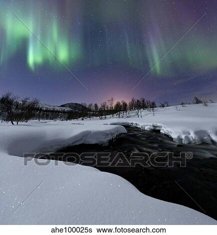 Aurora Borealis over Blafjellelva RIver in Troms County, Norway. View Large Photo Image Stock Photograph - Aurora Borealis over Blafjellelva RIver in Troms County, Norway.. Fotosearch