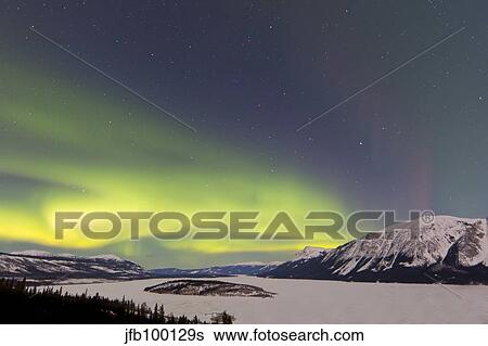 Aurora borealis over Bove Island, Yukon, Canada. View Large Photo Image Stock Photograph - Aurora borealis over Bove Island, Yukon, Canada.. Fotosearch
