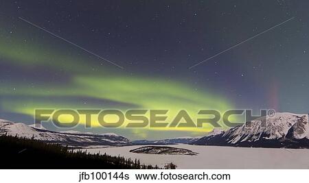 Aurora borealis over Bove Island, Yukon, Canada. View Large Photo Image Stock Photograph - Aurora borealis over Bove Island, Yukon, Canada.. Fotosearch