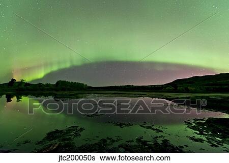 Aurora borealis over Fish Lake, Whitehorse, Yukon, Canada. View Large Photo Image Stock Photograph - Aurora borealis over Fish Lake, Whitehorse, Yukon, Canada.. Fotosearch