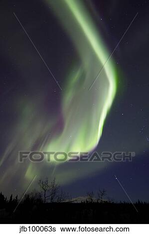 Aurora borealis over Fish lake with Orion's Belt, Yukon, Canada. View Large Photo Image Stock Photograph - Aurora borealis over Fish lake with Orion's Belt, Yukon, Canada.. Fotosearch